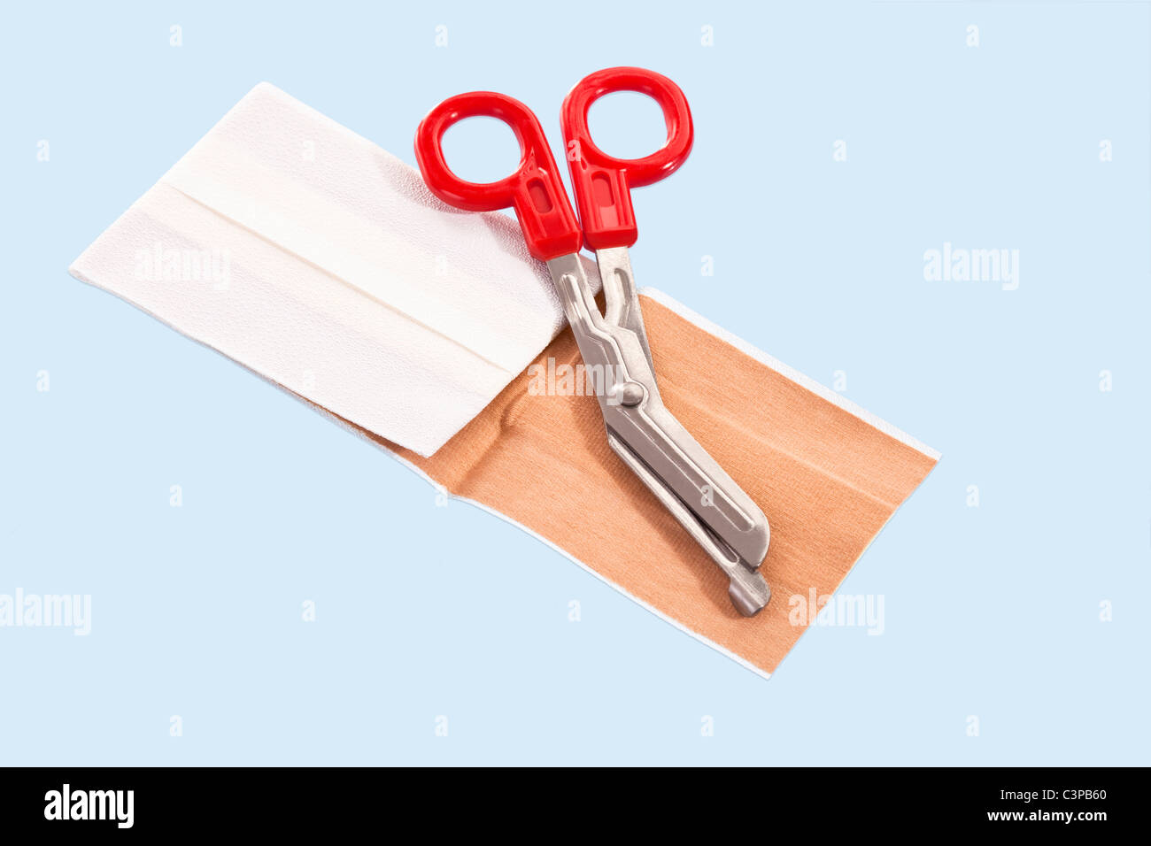 Scissors and Band aid plaster Stock Photo Alamy