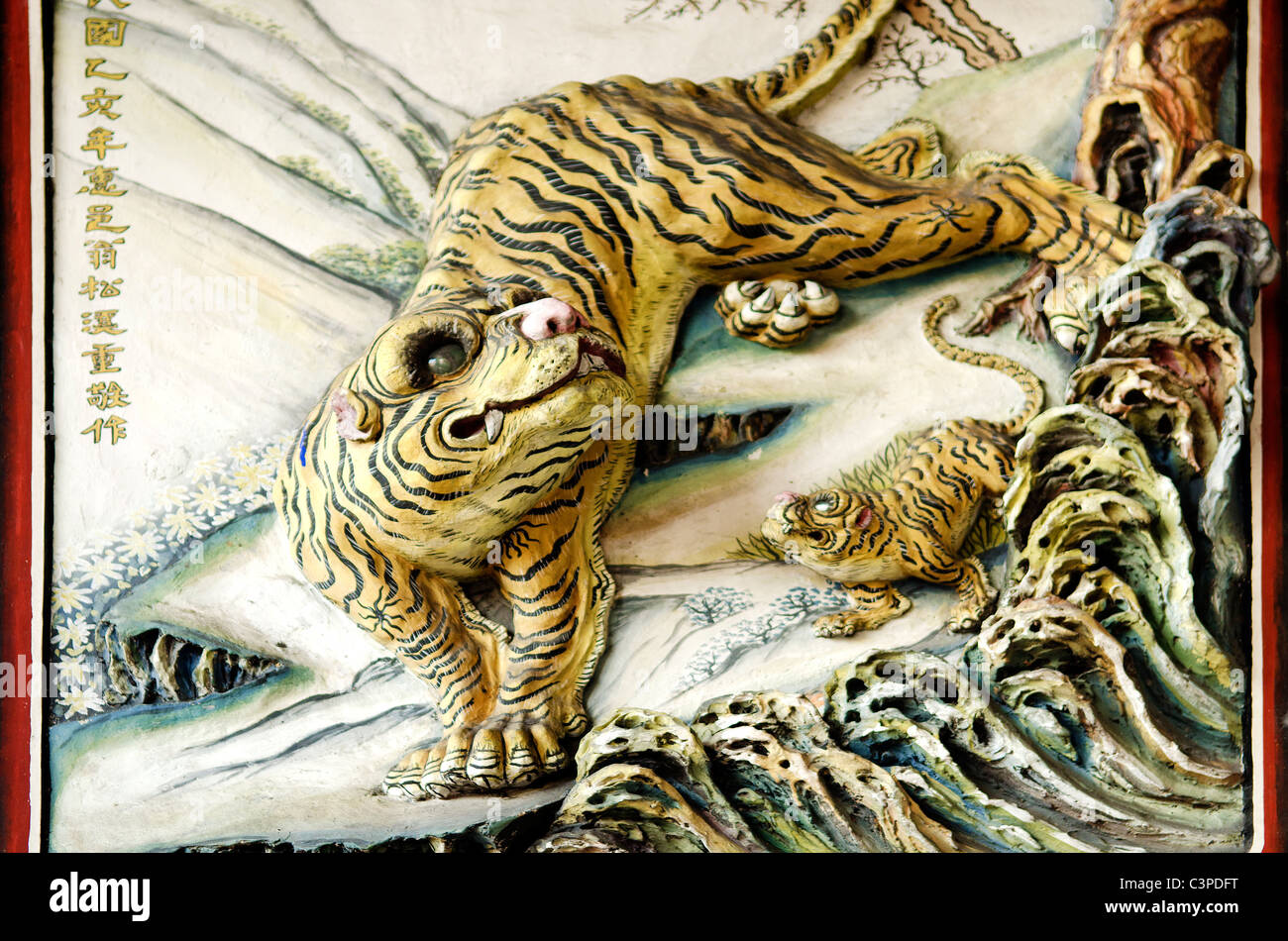 tiger sculpture in chinese temple in penang malaysia Stock Photo