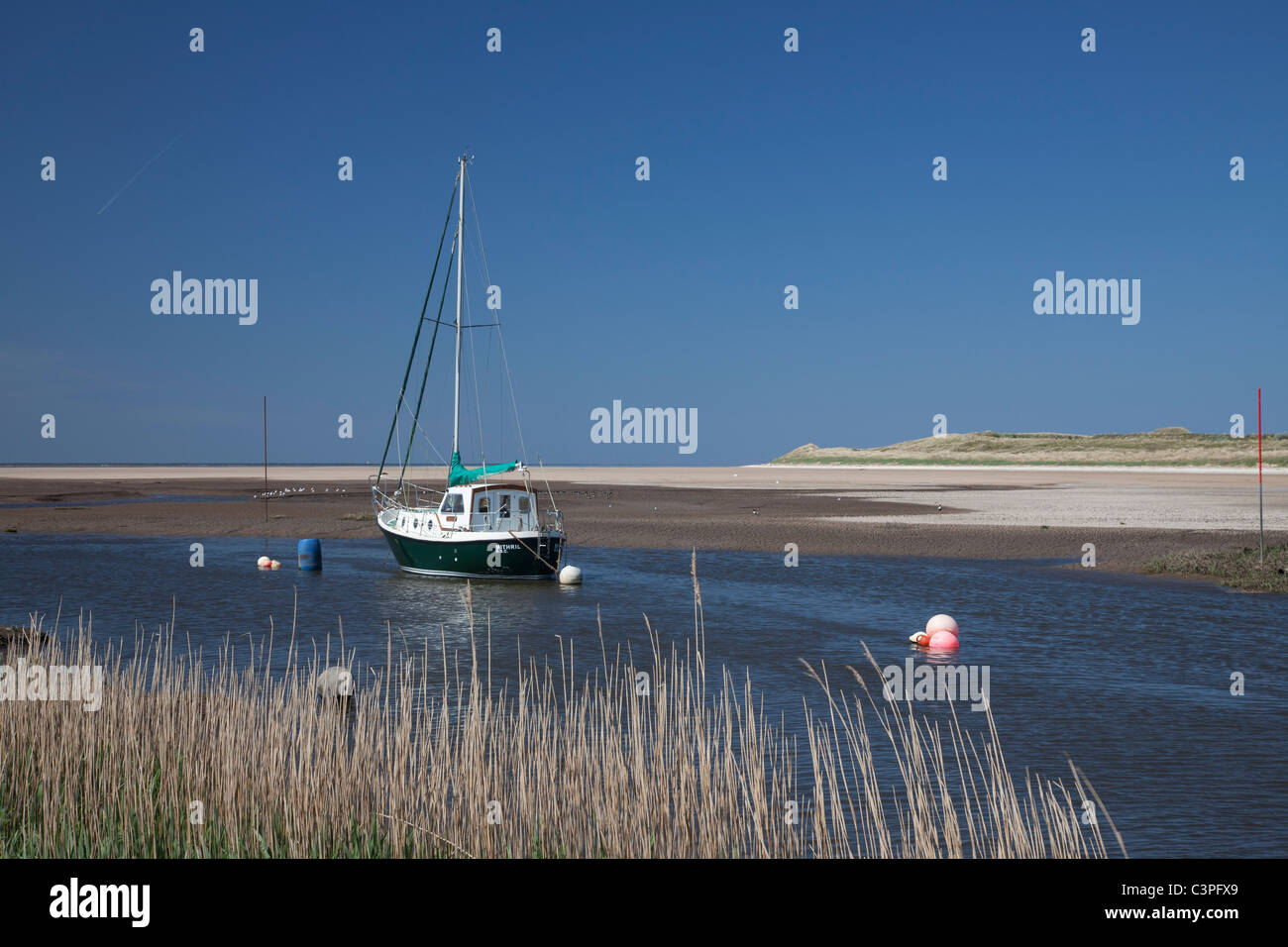 The river Alt meets the river Mersey at Hightown Stock Photo