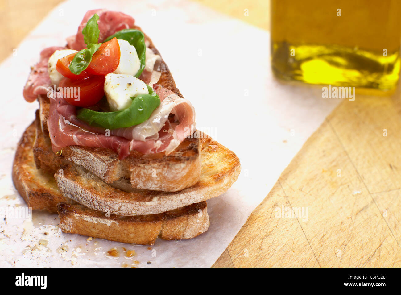 Roasted Sandwich with Parma ham, mozzarella cheese, tomatoes and basil
