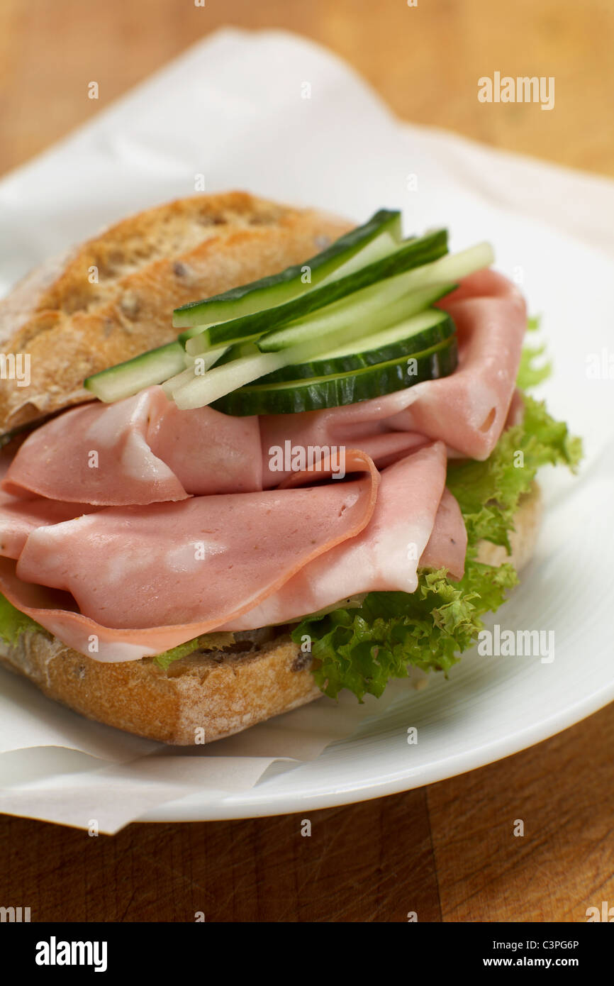 Sandwich with mortadella, salad and cucumber slices, closeup Stock Photo Alamy
