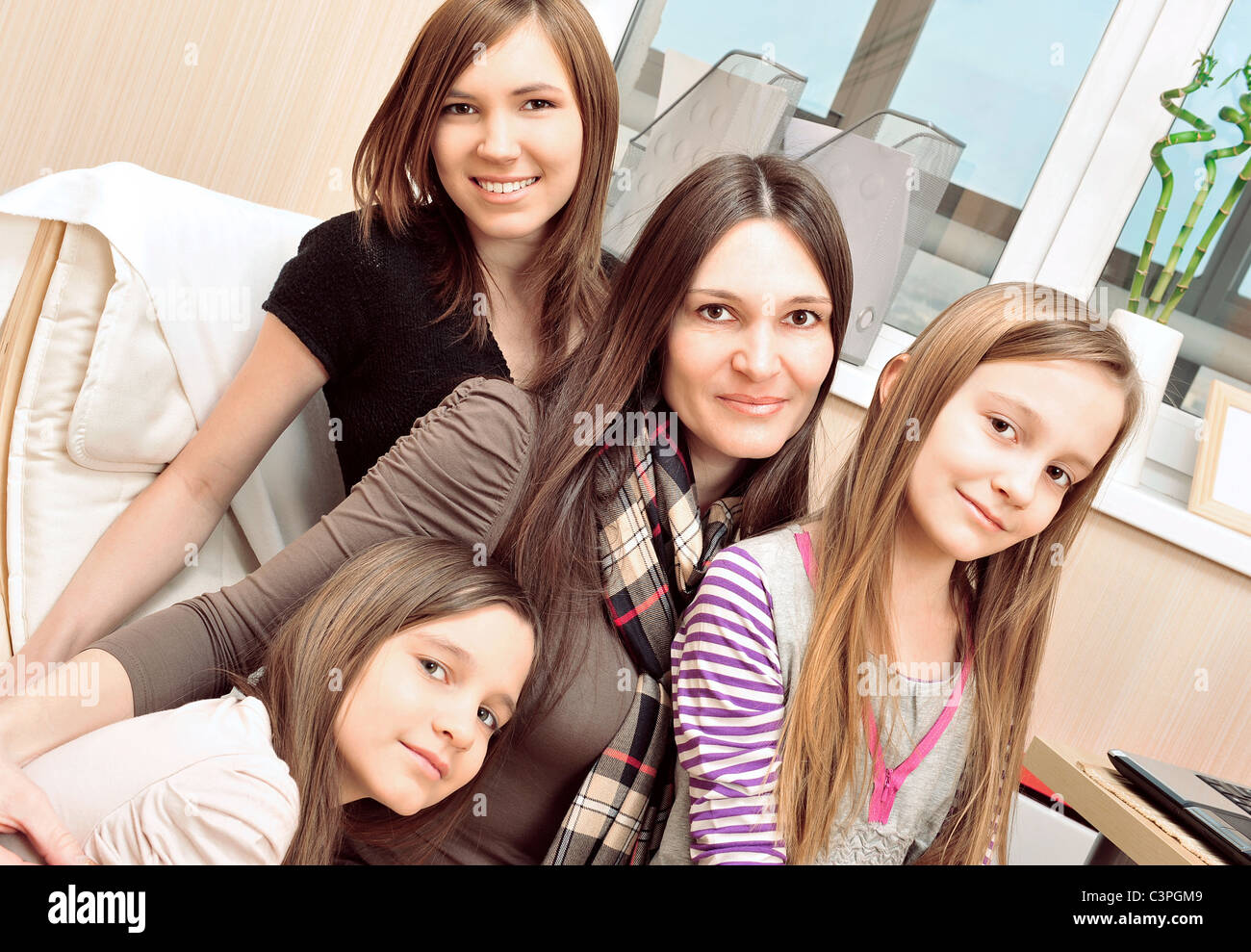 Portrait of happy family of only girls having fun together at their  apartment Stock Photo - Alamy