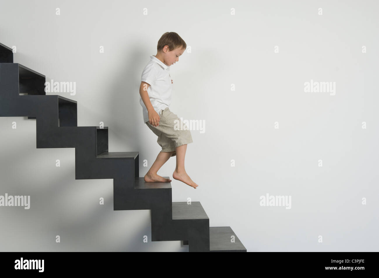 Boy running down steps hires stock photography and images Alamy
