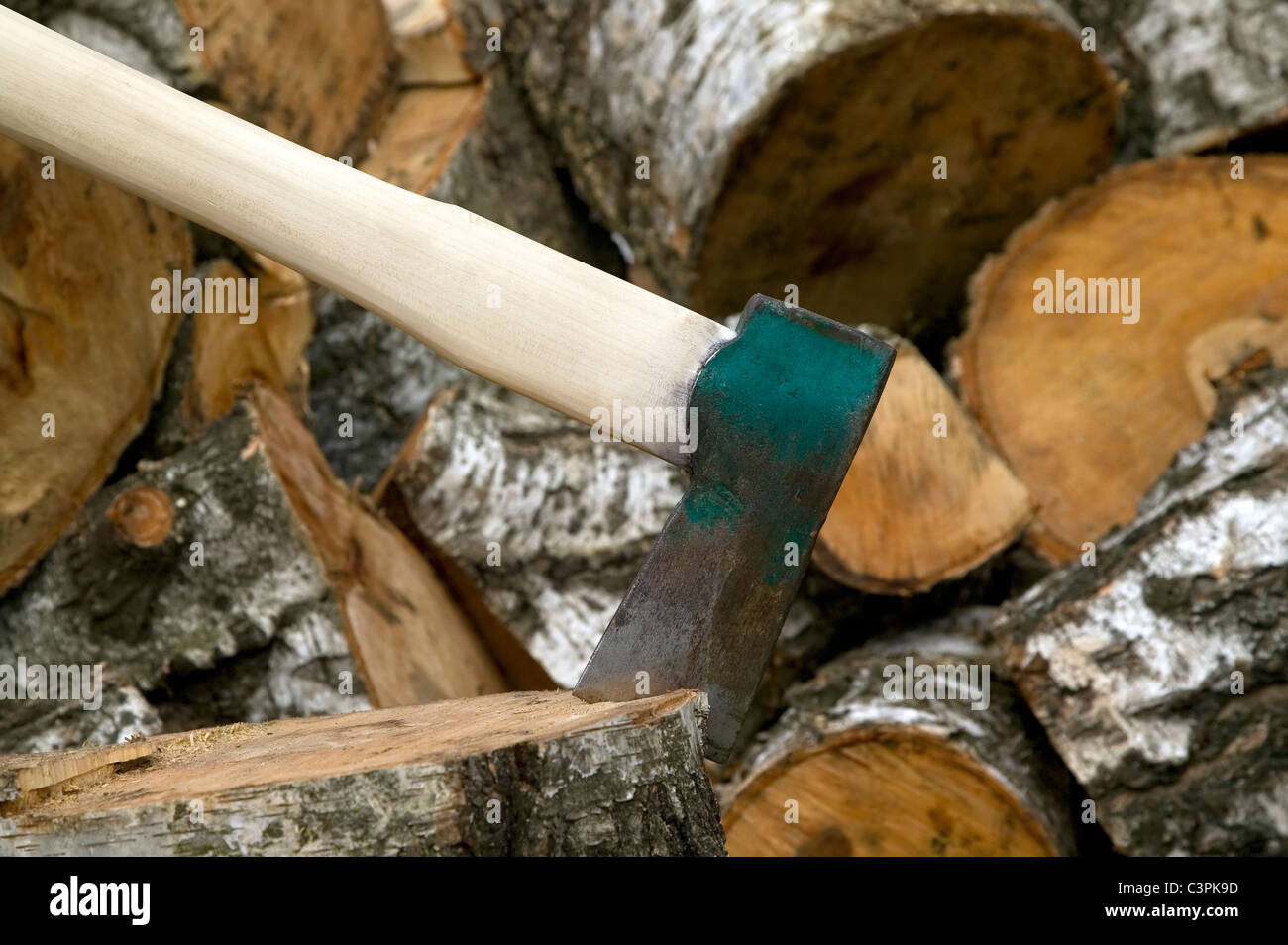 Axe with wooden handle is cut to log Stock Photo Alamy