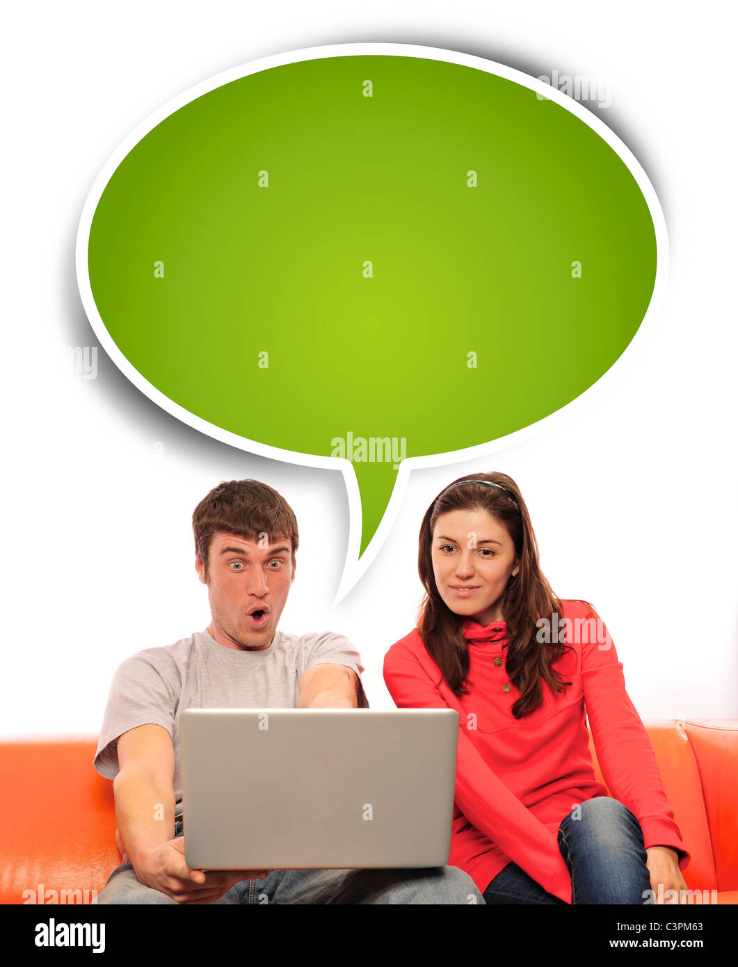 Portrait of a young couple using a computer. Isolated white background ...