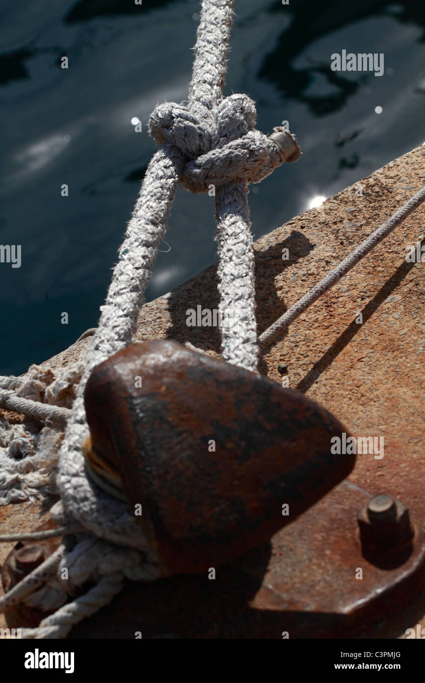 Detail view of bollard with bowline attached Stock Photo