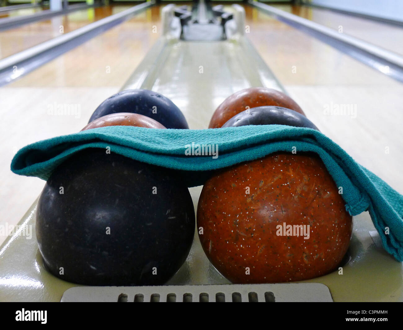 Bowling balls ready at a retro bowling alley. Stock Photo