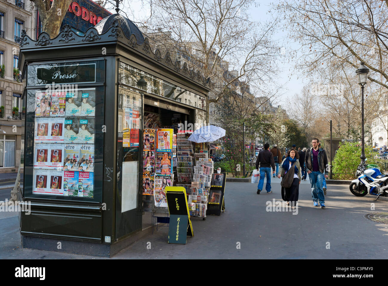 Typical newspaper kiosk on the Boulevard Rochechouart, Montmartre, Paris, France Stock Photo
