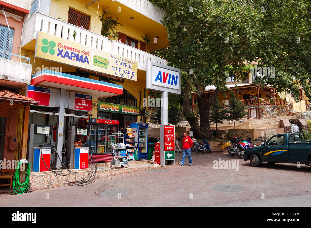 Gas station's price sign, Spili village, Crete, Greece Stock Photo