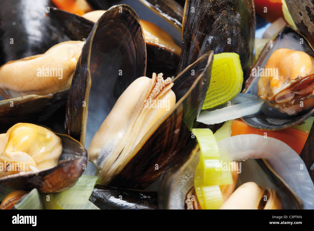 Mussel opened with mixed vegetable, close up Stock Photo Alamy