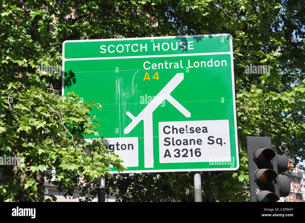 Scotch House street sign Knightsbridge Central London chelsea sloane square street sign traffic taxis Stock Photo