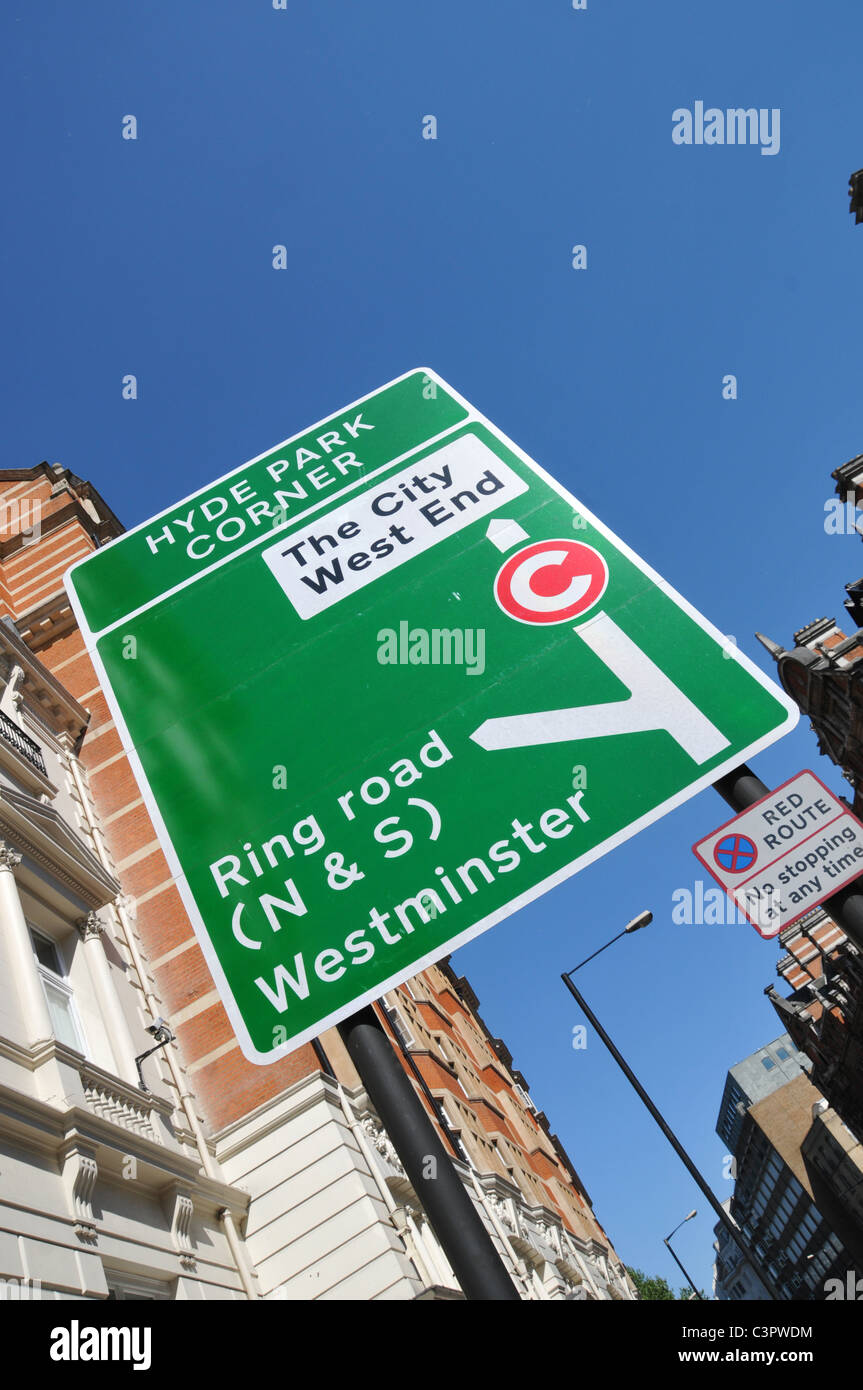 Hyde Park Corner London West End road sign directions traffic roads Stock Photo