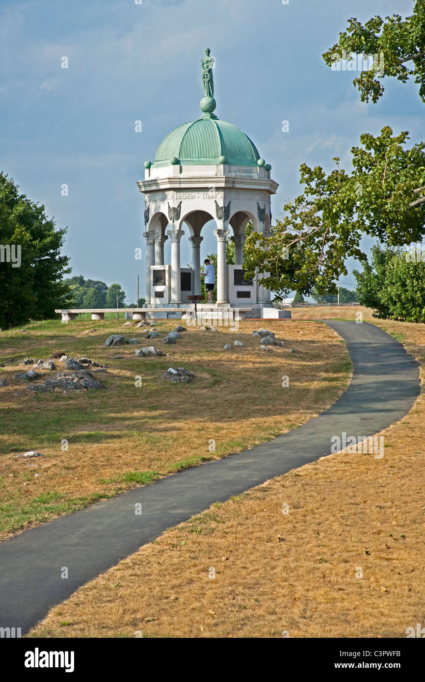 Man reads plaque in The Maryland State Monument dedicated to both sides of the Battle of Antietam. Stock Photo