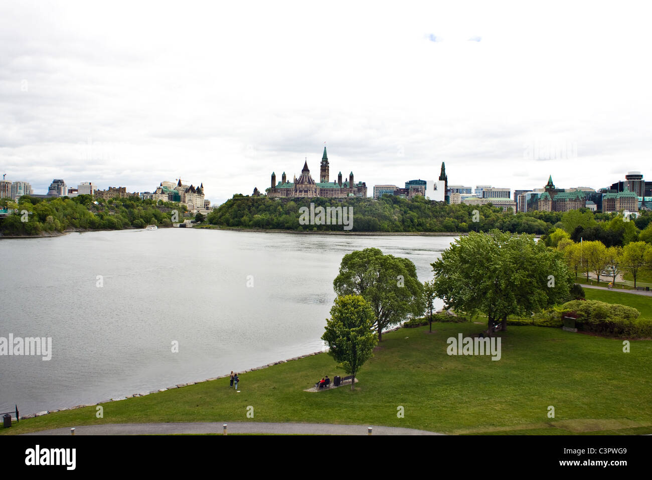 Parliament of Canada situated in Ottawa on Parliament Hill. View over the Ottawa river. Stock Photo