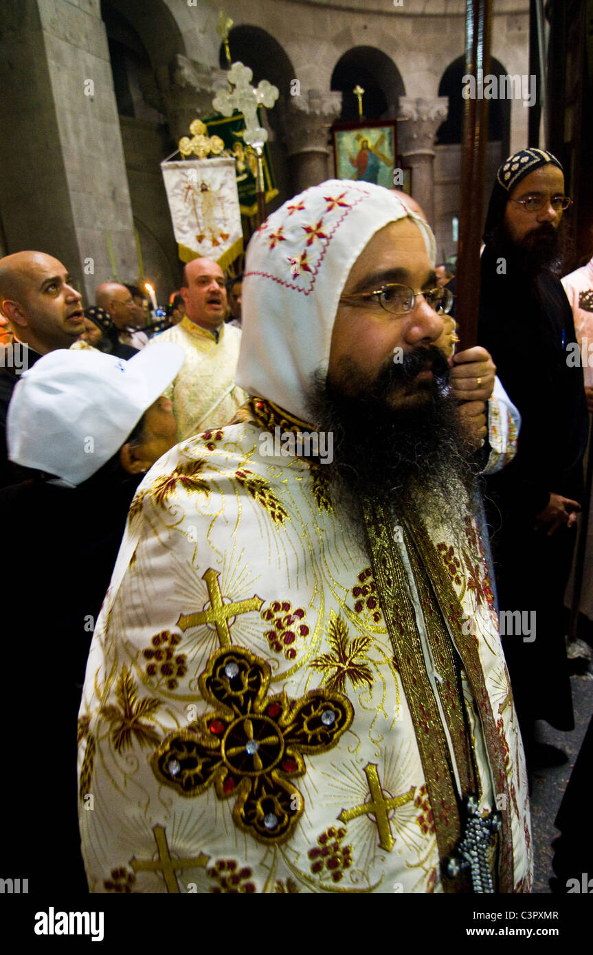 Palm Sunday celebrations in Jerusalem. A Syrian Orthodox priest in the Church of the Holy Sepulchre. Stock Photo