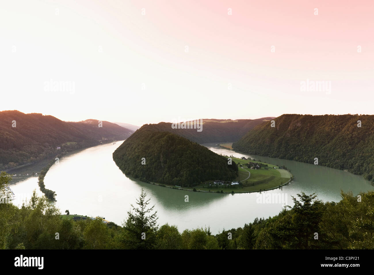 Austria, View of mountain ranges with danube river at dusk Stock Photo