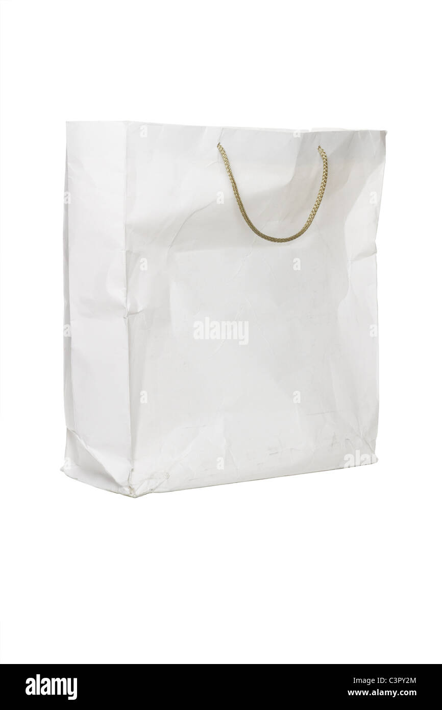 Old crumpled used paper bag on white background Stock Photo