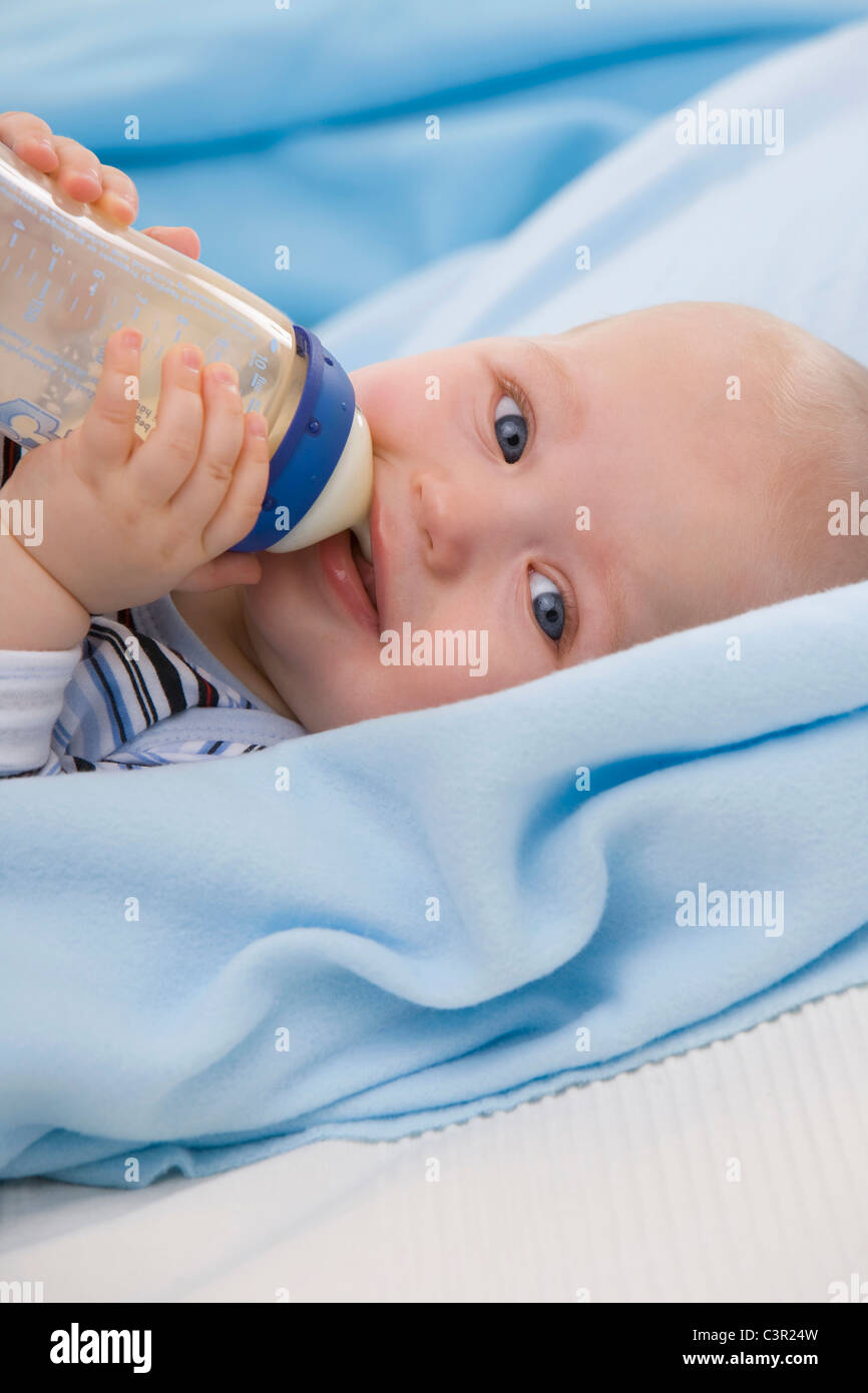 Baby boy (6-11 months) drinking milk, smiling, portrait Stock Photo - Alamy