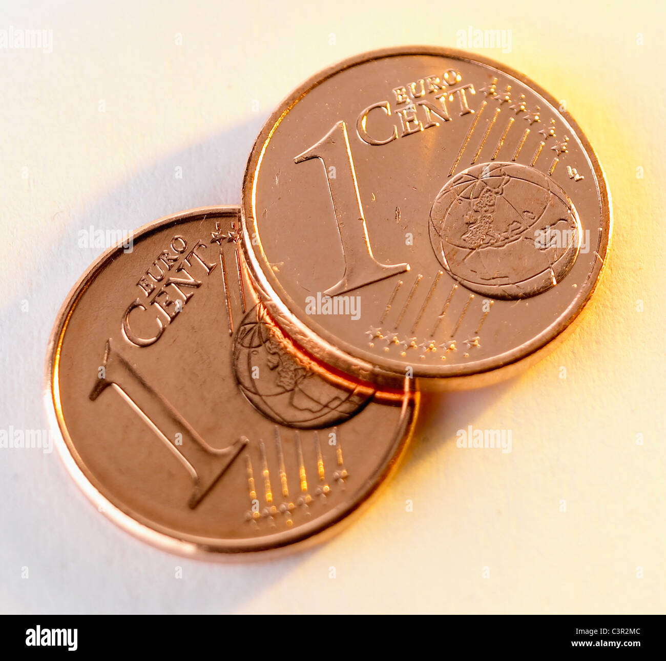 One euro coins on white background Stock Photo