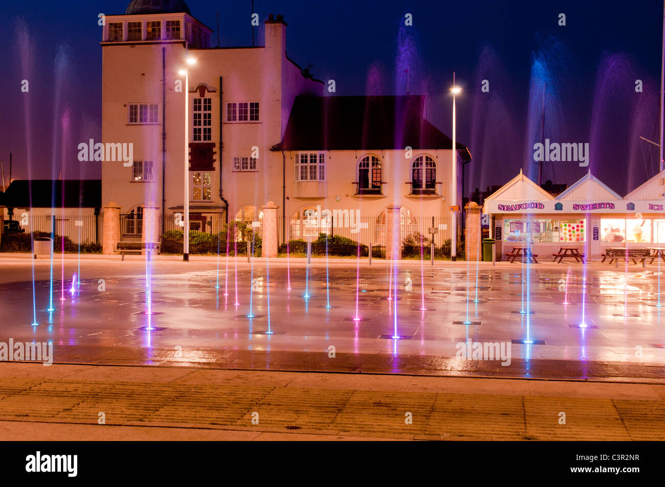 Colorful water fountains at night in Lowestoft Suffolk UK tourist