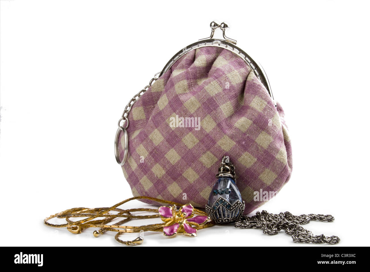 The handwork does bag and jewelry isolated on white Stock Photo