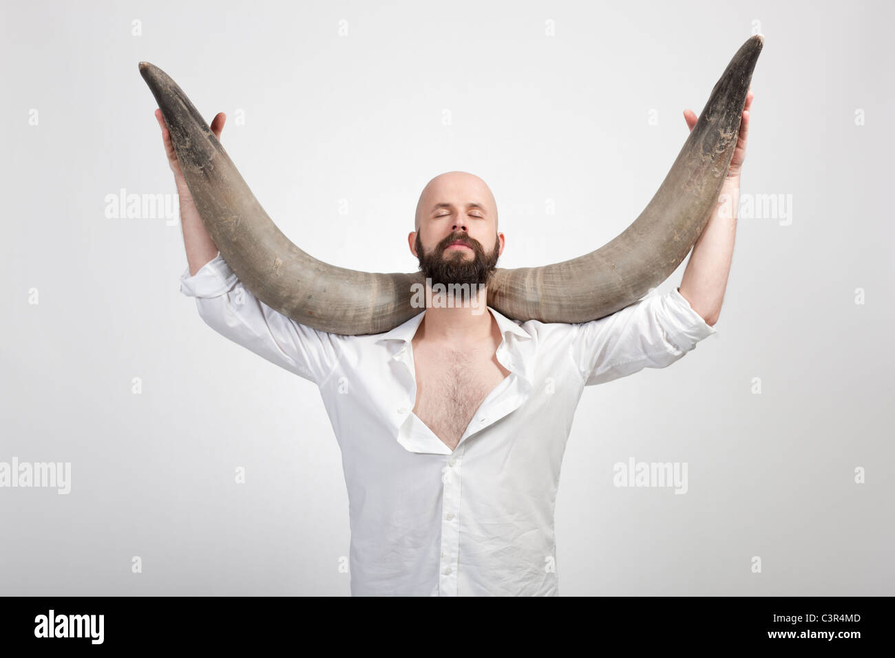 Man with horns hires stock photography and images Alamy