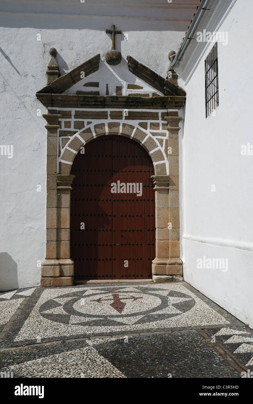 A church entrance in Fuentes de León, in the province of BadajozFuentes de León, in the province of Badajoz, Extremadura, Spain. Stock Photo