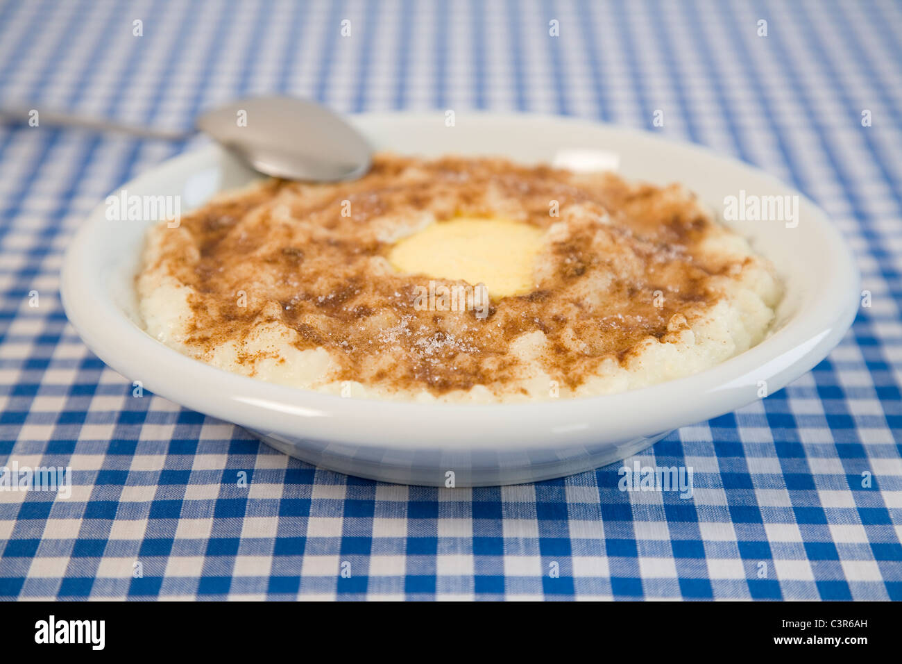 Rice porridge with cinnamon and sugar Stock Photo