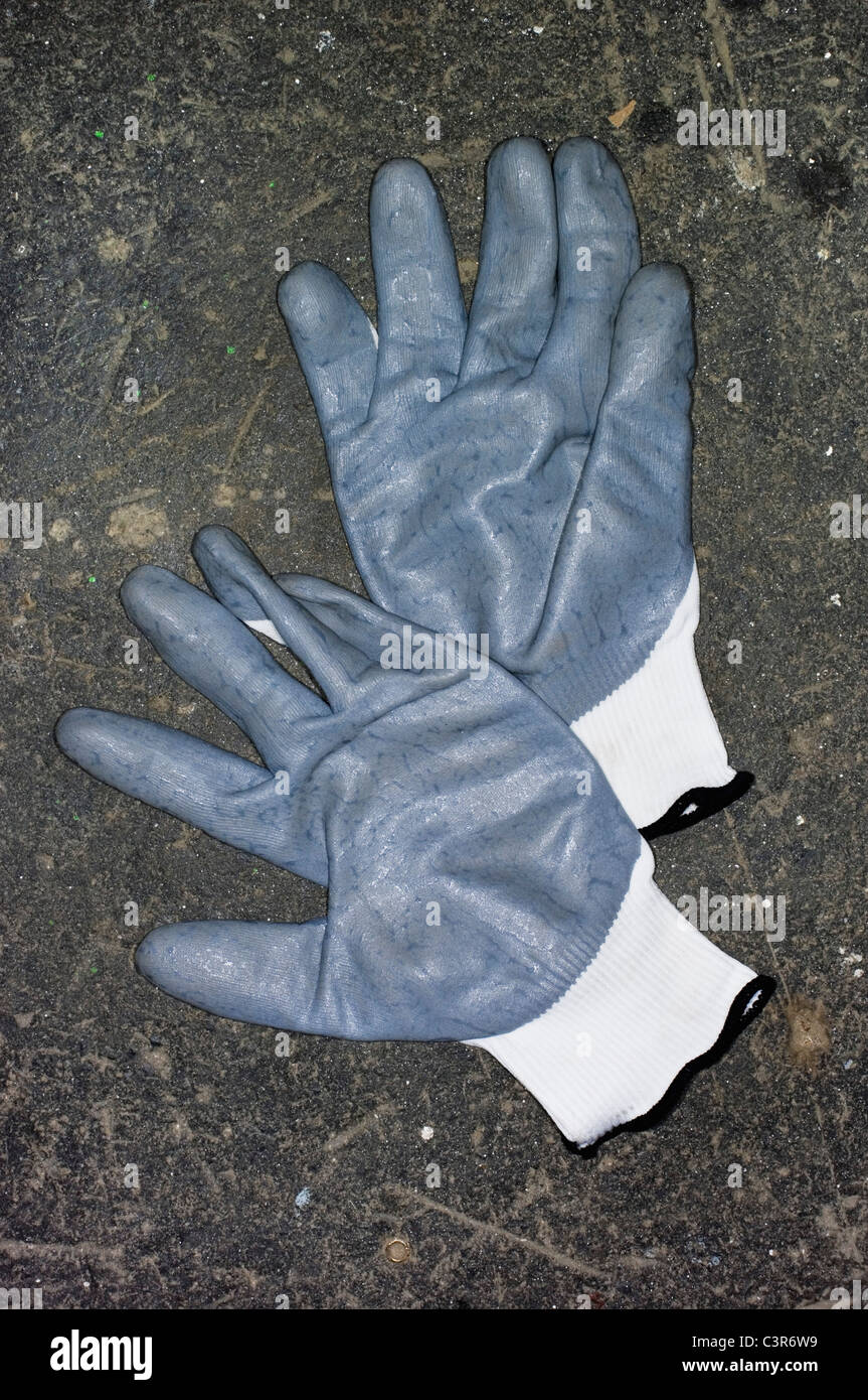 Germany, Hessen, Frankfurt, pair of work gloves in factory Stock Photo