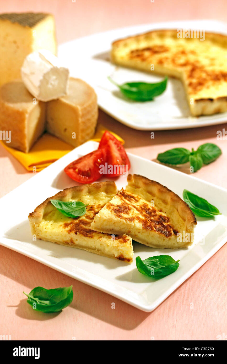 Tart with three cheeses. Recipe available. Stock Photo