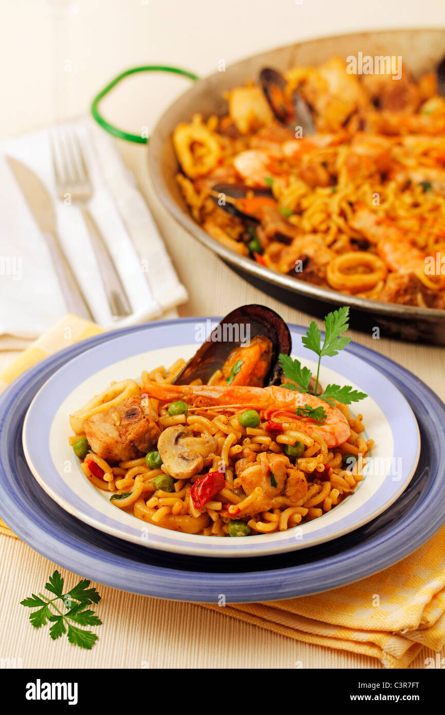 a spanish fideua, a typical noodles casserole with seafood Stock Photo -  Alamy