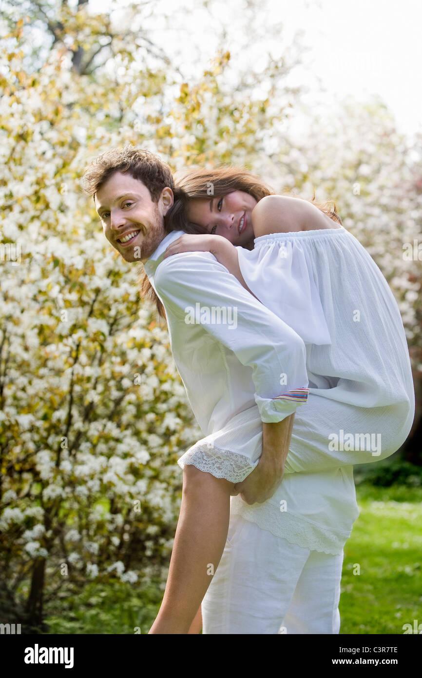 Love couple having fun in the park Stock Photo - Alamy