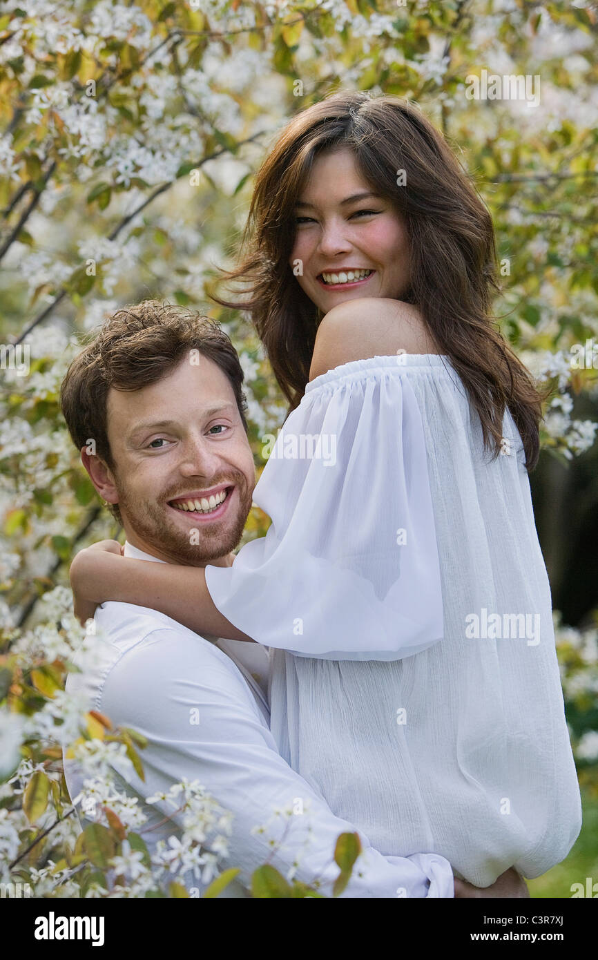 A couple hugging in the park Stock Photo - Alamy
