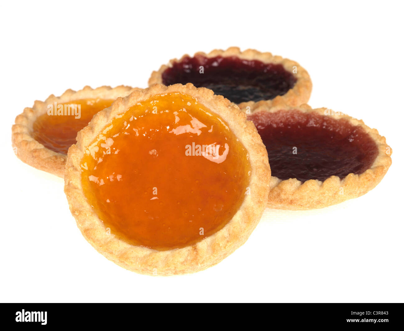 Fresh Individual Traditional Sweet Jam Tarts Isolated Against A White Background With A CLipping Path And No People Stock Photo