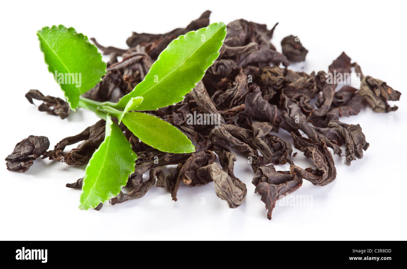 Heap Of Dry Tea With Green Tea Leaves Isolated On A White Background Stock Photo Alamy
