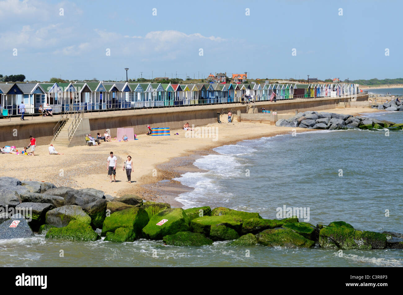 Beach and Beach Huts at Southwold, Suffolk, England, UK Stock Photo