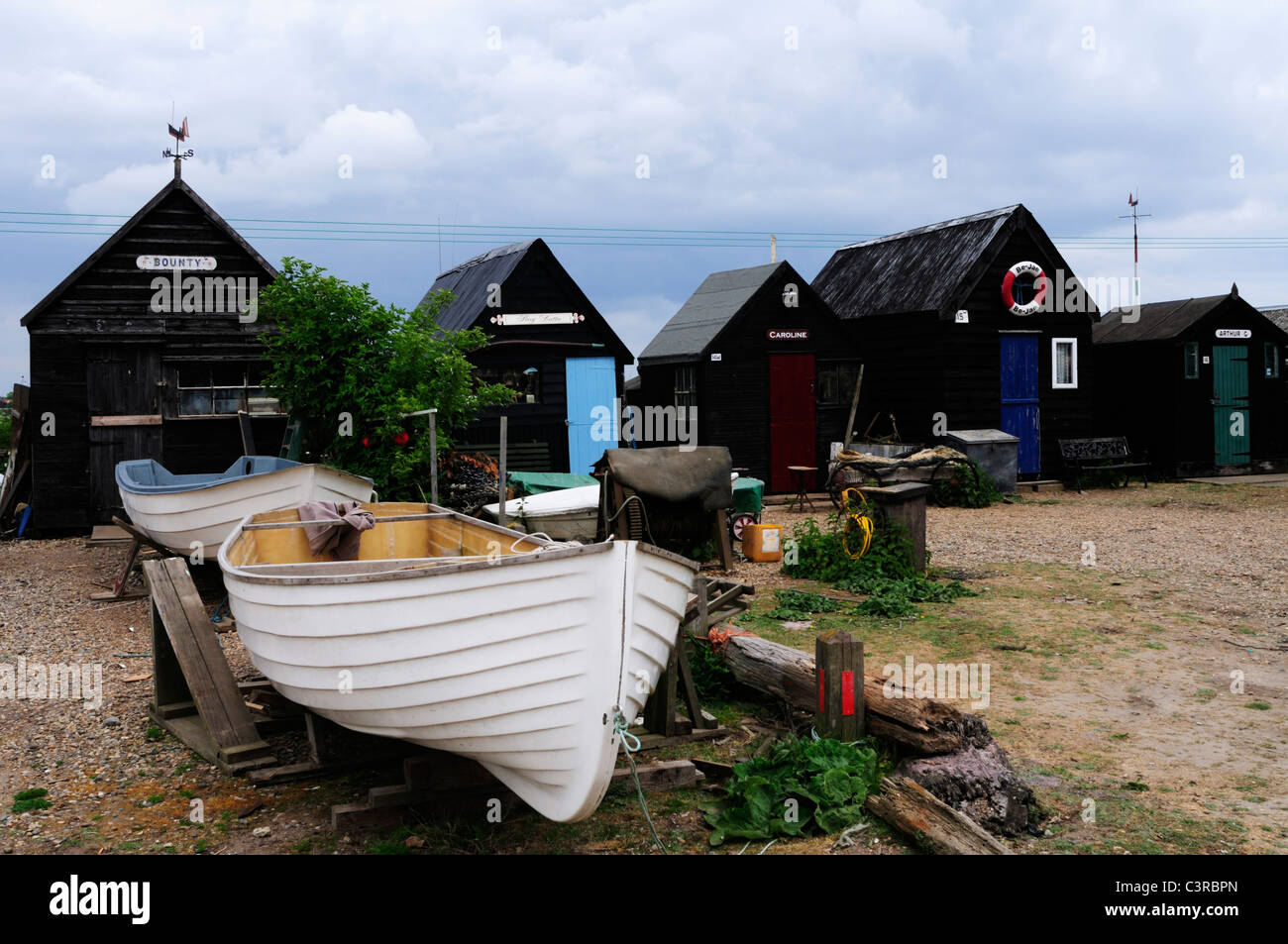 Fisherman's Huts and Dinghies at Southwold Harbour, Suffolk, England, UK Stock Photo