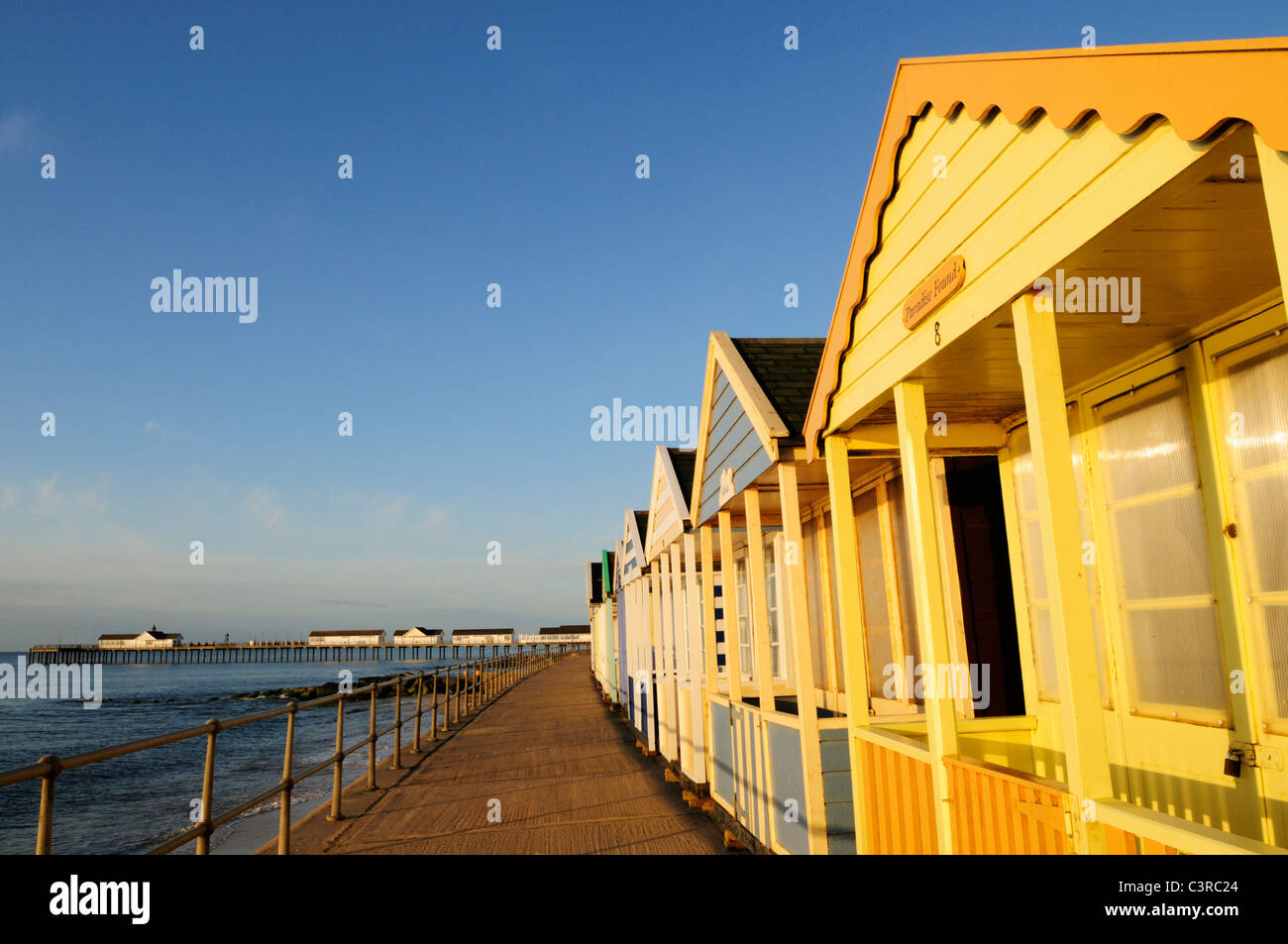Beach Huts and Pier at Southwold, Suffolk, England, UK Stock Photo