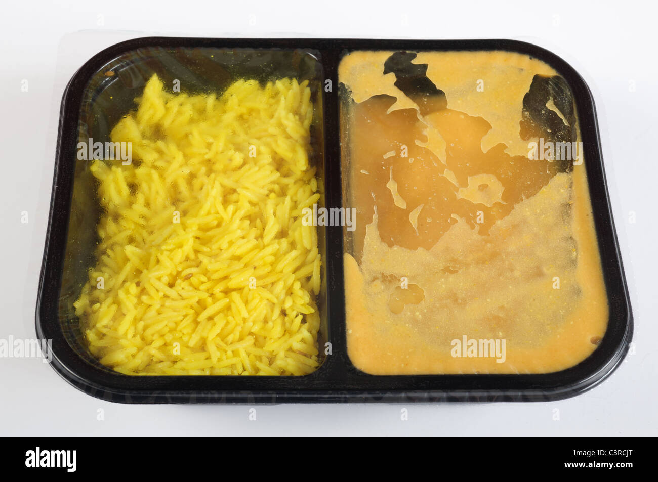 Chicken Korma and Pilau rice ready meal Stock Photo