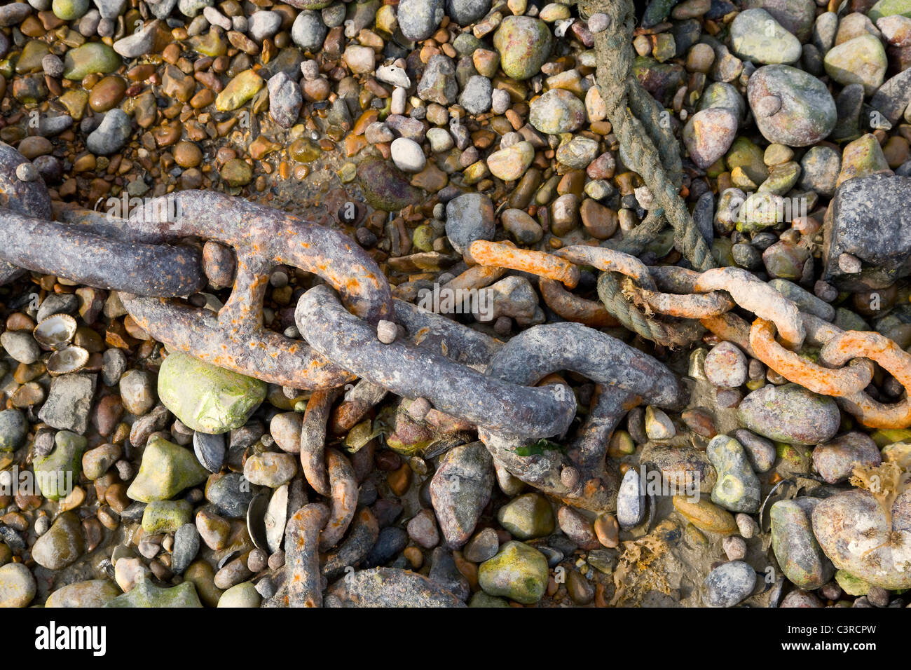 Rusty Rope Rusty chains and mooring ropes on a beach Stock Photo - Alamy