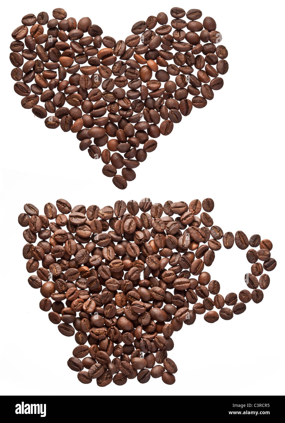 Coffee beans in form of heart and cup isolated on a white. Stock Photo