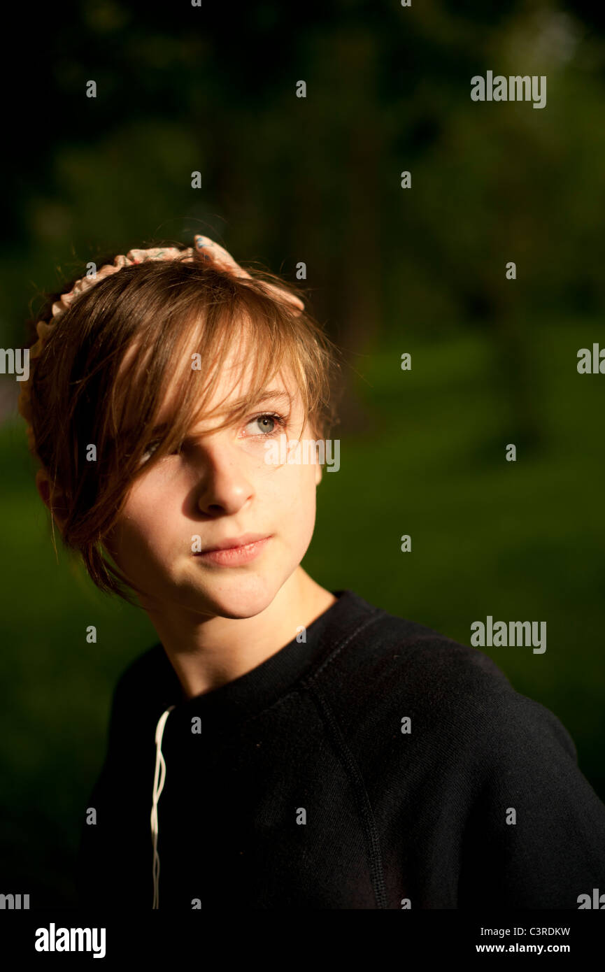 A 12-13 year teenage old girl, outdoors UK Stock Photo