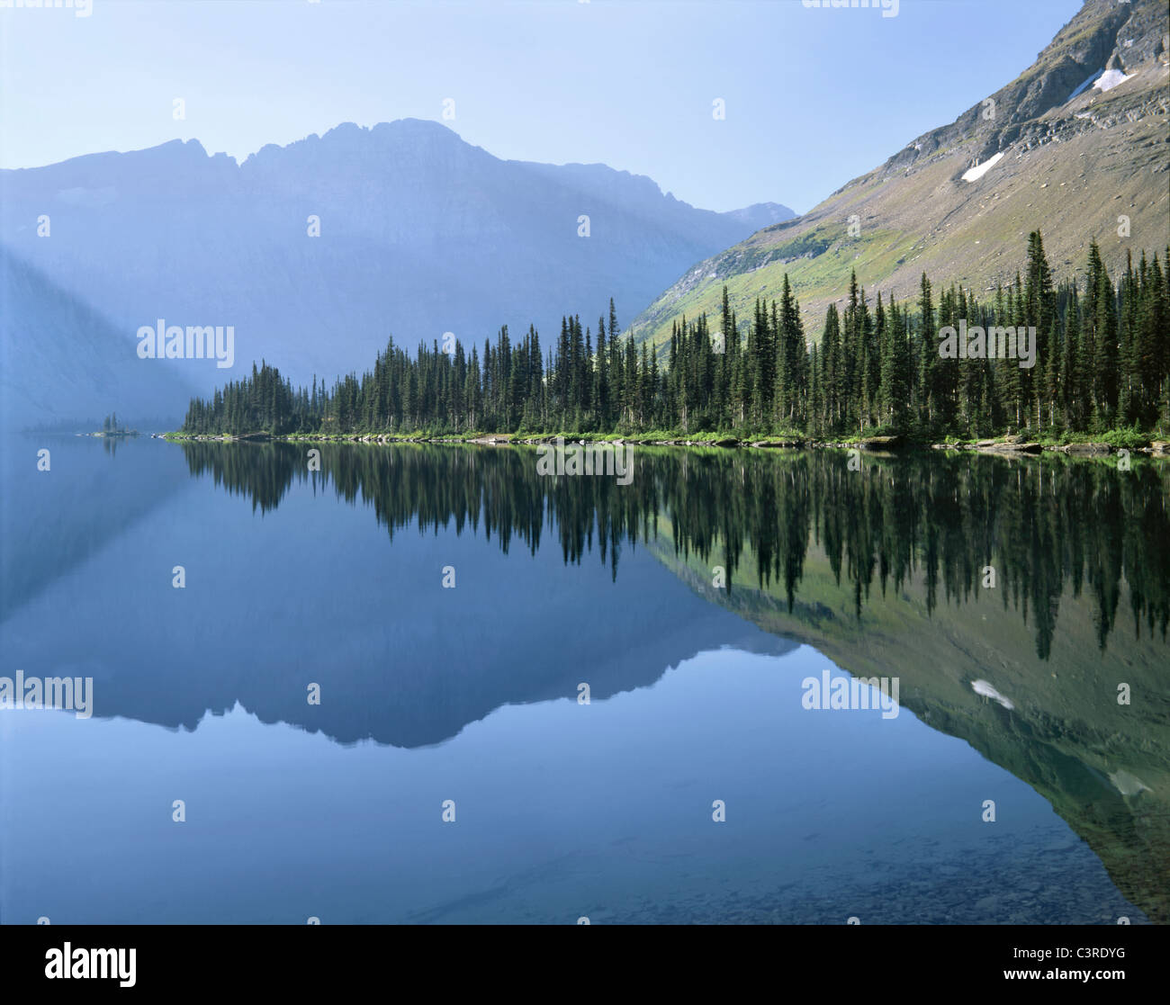 Perfect Reflection In A Mountain Lake Glacier National Park Montana perfect-reflection-in-a-mountain-lake-glacier-national-park-montana