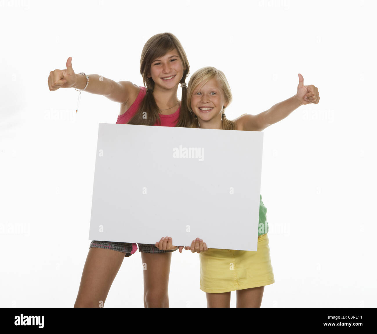 Two girls side by side Cut Out Stock Images & Pictures - Alamy