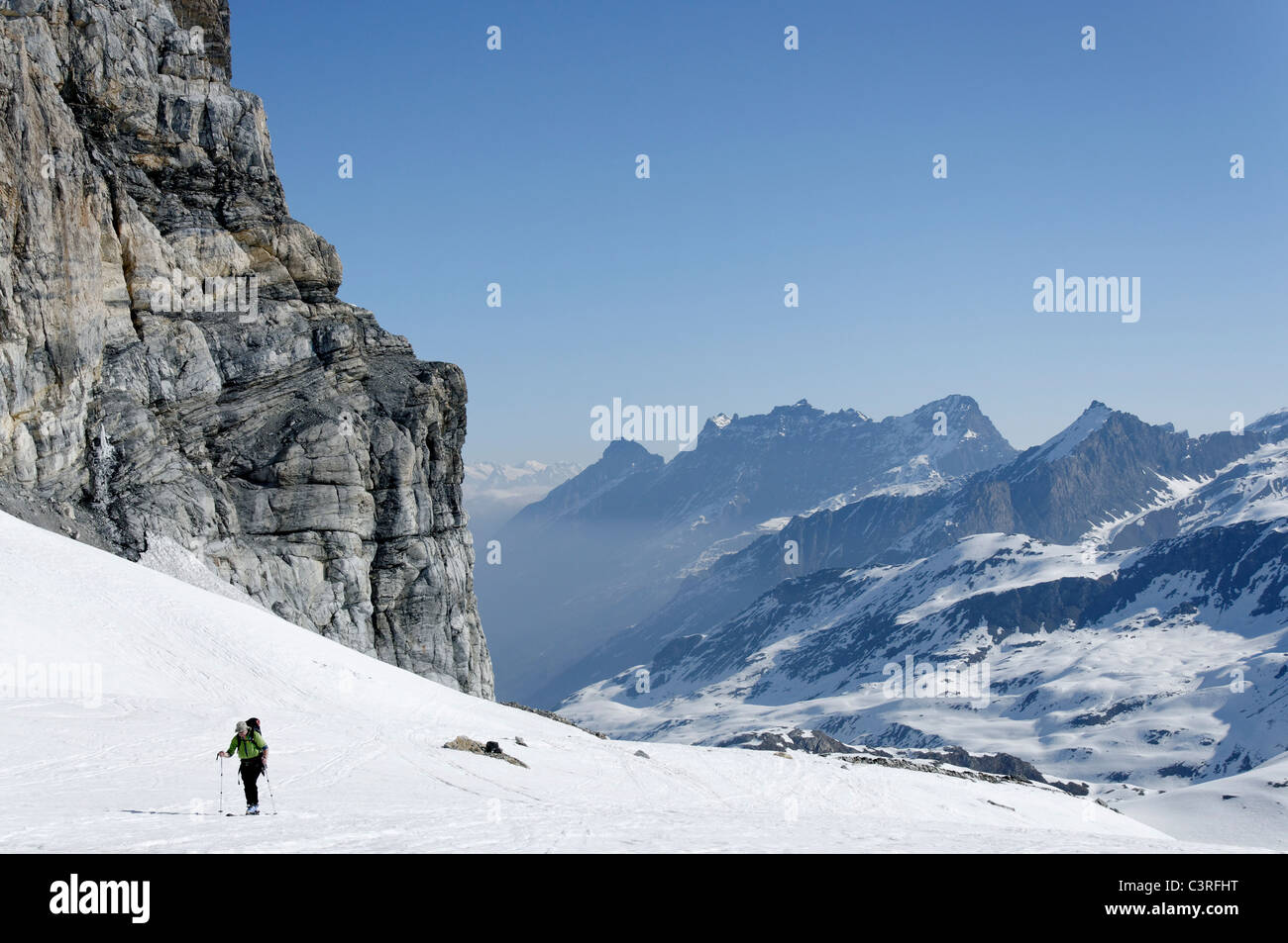 Enjoying a fine day of spring ski touring of Punta Calabre in the Gran Paradiso National Park, Italy. Stock Photo