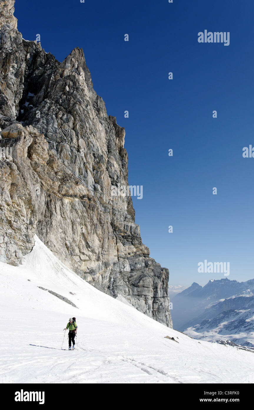 Enjoying a fine day of spring ski touring of Punta Calabre in the Gran Paradiso National Park, Italy. Stock Photo