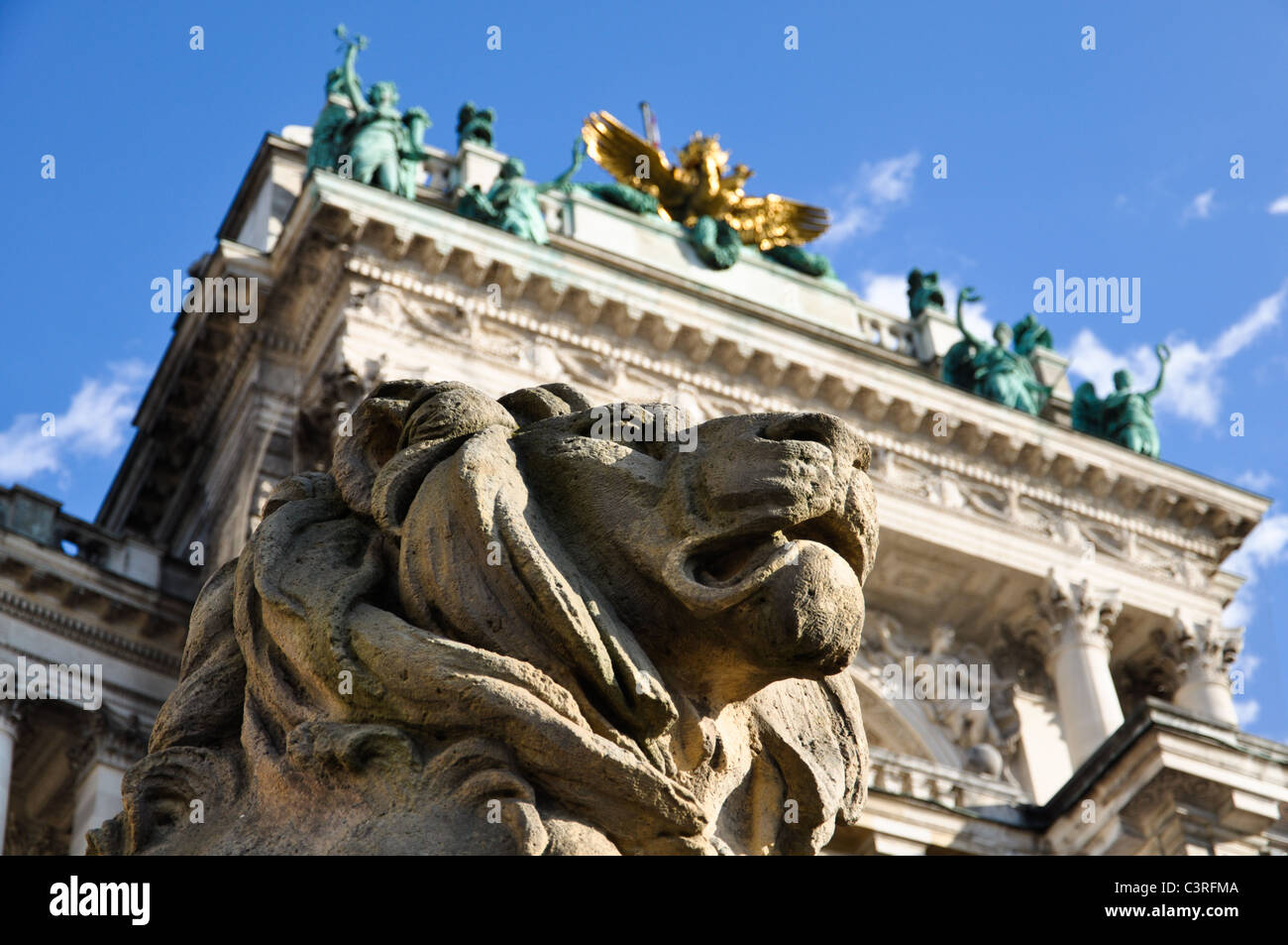 stone lion sculpture guarding Vienna's national library Stock Photo Alamy