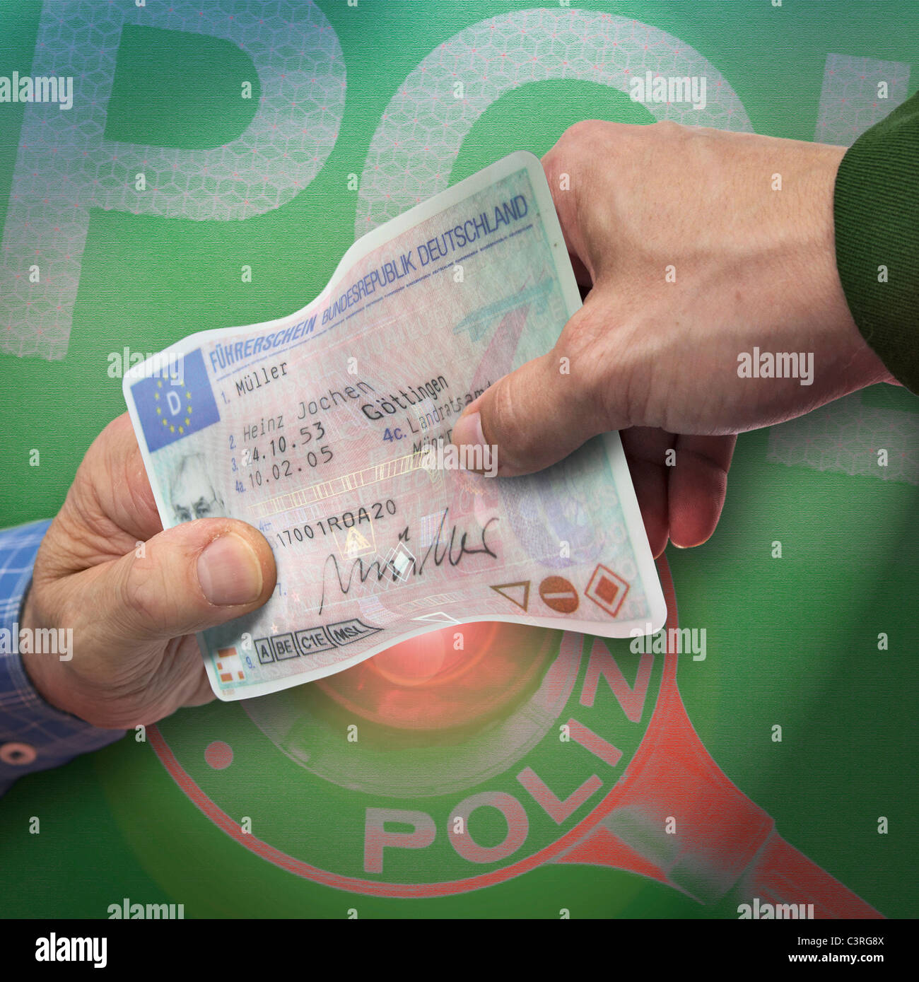 Human hands holding driving license, close up Stock Photo