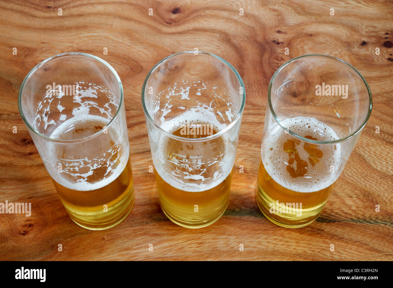 Halfempty beer glasses Stock Photo Alamy