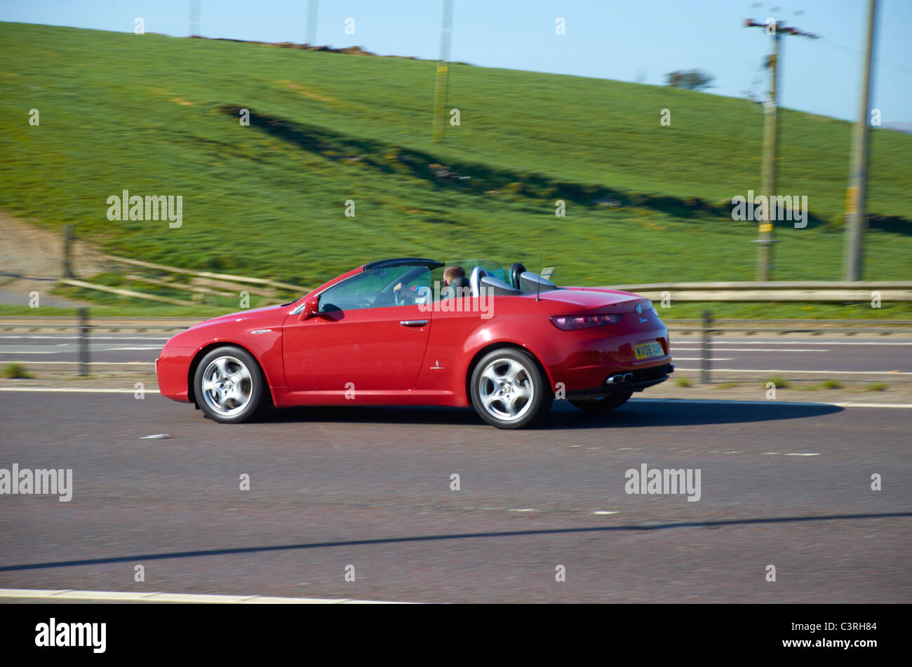 Open top car on the motorway Stock Photo Alamy